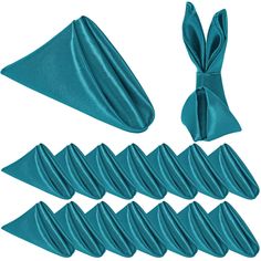 teal satin napkins with matching ties and bowknots on white background