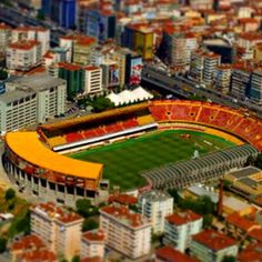 an aerial view of a soccer stadium in the city