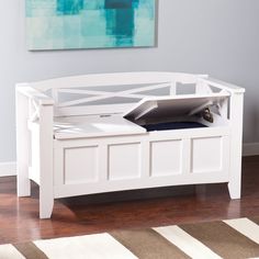 a white storage bench in a living room