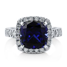 a cushion cut blue sapphire and diamond ring