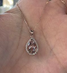 "Beautiful Morganite and Diamond Necklace 14K rose gold pendant. Lays nicely on the neck. Just the perfect size. Genuine pink morganite pear cut 2.40 carats morganite 12x8mm pear morganite Clarity: VS Eye clean stone Genuine earth mined round brilliant cut diamonds 0.40 carats diamonds 18\" 14K Rose Gold necklace Comes with gift box" Pear-shaped Rose Gold Necklace For Formal Occasions, Fine Jewelry Pear-shaped Rose Gold Necklace, Fine Jewelry Rose Gold Pear-shaped Necklace, Morganite Teardrop Jewelry Gift, Rose Gold Pear-shaped Fine Jewelry Necklace, Teardrop Morganite Jewelry Gift, Fine Jewelry In Rose Gold With Pear-shaped Design, Fine Jewelry In Pear-shaped Rose Gold, Pear-shaped Rose Gold Sterling Silver Jewelry