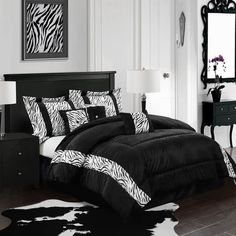 black and white bedroom with zebra print bedding