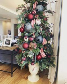 a decorated christmas tree in a living room