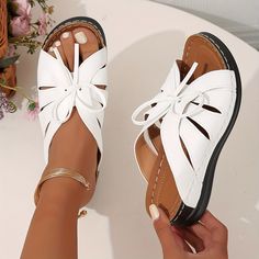 White Open Toe Casual Wedge Sandals, White Toe Post Wedge Sandals For Summer, Comfortable White Platform Wedge Sandals, Comfortable White Closed Toe Wedge Sandals, Comfortable White Wedge Sandals, White Toe Post Wedge Sandals For Beach, White Flat Wedge Sandals Casual, Casual White Flat Wedge Sandals, Comfortable White Open Toe Wedge Sandals