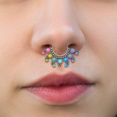 This is a very beautiful Surgical Steel clicker ring with Opal stones. The listing is for ONE clicker ring. This item does not contain nickel. --- C u s t o m i z i n g --- Your septum ring can be made in the following gauges (gauge means thickness): 18, 16, 14. --- M a t e r i a l s --- All septum ring metal parts are made of 316L Surgical Steel. --- M e a s u r e m e n t s --- Your septum ring can be made in the following INNER diameters: 8mm, 10mm, 12mm, 14mm. Please select inner diameter dur Unique Multicolor Hypoallergenic Jewelry, Unique Hypoallergenic Multicolor Jewelry, Nickel-free Multicolor Fusion Jewelry, Multicolor Nickel-free Fusion Jewelry, Bijoux Piercing Septum, Septum Earrings, Opal Septum, Septum Piercing Jewelry, Daith Earring