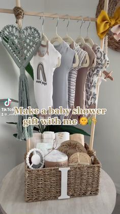 a baby shower gift basket on a table with the words, diy gift hamper make a baby shower gift with me