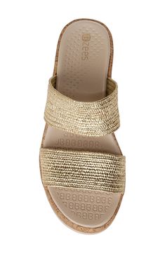 Treat yourself to the resort-ready comfort of this playful slide sandal featuring a duo of playful, woven straps and a chunky wedge heel. An air-infused outsole keeps your stride light and bouncy as the cushy, anatomical footbed cradles each step. Lightweight: puts cushioning and performance underfoot with an emphasis on streamlined comfort Cushioning: absorbs impact and distributes weight for consistent, buoyant comfort under each step 2 1/4" heel; 1" platform Treated with antimicrobial technol Beach Slide Wedge Sandals With Textured Sole, Beach Wedge Slide Sandals With Textured Sole, Beach Wedge Sandals With Textured Sole And Slide Shape, Summer Slide Wedge Sandals With Cushioned Footbed, Modern Synthetic Sandals For Vacation, Synthetic Sandals With Textured Sole For Vacation, Vacation Sandals With Textured Sole And Synthetic Material, Modern Wedge Heel Beach Sandals, Modern Wedge Heel Sandals For Beach