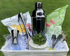 a picnic basket filled with utensils and other items