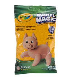 a bag of model magic pig toy on a white background