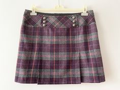 "Vintage Plaid mini skirt, purple gray wool blend tartan skirt, checkered women's skirt, back to school, gift for her, size large Measurements: Waist: 34\" Hips: 40\" Length: 16.5\" Please check measurements to insure a proper fit. Remember to allow yourself some extra room for movement. You can compare these with something from your closet that fits you well. Condition: Great vintage condition SHIPPING * I ship worldwide via Priority mail (Latvijas Pasts) from Latvia (EU). * I ship from Europe, so please allow 2 to 4 weeks for the package to arrive if you live overseas. * Europe 5 - 10 business days. Go back to my shop: YourEclecticStreet.etsy.com P.S. why buy Vintage? - Vintage is Unique! - Vintage is Eco Friendly! - Vintage is Inspirational! - Vintage is History! - Vintage is an Investm Winter Mini Length Plaid Skirt, Plaid Mini Skirt For School In Winter, Winter School Plaid Mini Skirt, School Fitted Plaid Mini Skirt, Fitted Plaid Skort For Winter, Plaid Mini Skort For School Uniform, Plaid Mini Skirt Skort For School Uniform, Plaid Mini Skirt For Work, Fitted Purple Mini Skirt For Fall