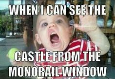 a baby is screaming while holding an apple in front of his face and the caption reads, when i can see the castle from the monorail window