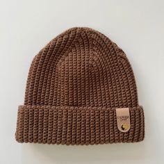 "This ribbed beanie is the perfect addition to anyone's wardrobe. Crafted from a blend of wool and acrylic materials, it offers a lightweight and comfortable fit. The textured ribbing detail adds style and texture to any outfit. This classic style is timeless and perfect for cold winter days. The beanie is available in three sizes and in a variety of colors. The warm material will keep you cozy and fashionable all winter long. Get yours today and stay warm while looking your best! 🧶 Adult, children and baby sizes available   🧶 Unisex  🧶 Available in a selection of colours  🧶Adjustable folded brim  🧶 Can be customised 🌱Vegan Leather label   Beanie Composition: 50% Merino Wool 25% Acrylic  25% Microfibre OR  100% Acrylic  Sizing.                         Height (with 2 inch brim) Baby. Brown Winter Cap, Crochet Ribbed Hat, Winter Hat Crochet, Hat Inspiration, Bonnet Au Crochet, Ribbed Hat, Bonnet Crochet, Stylish Caps, Wool Winter