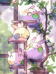 some cute little stuffed animals in a tree