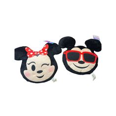 two mickey and minnie mouse masks with red sunglasses on them, one has a smiling face