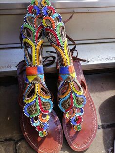 100% handmade using leather and fine beads. Masai beaded sandals are made using the pure original leather and quality African beads.They are inspired by the Masai community They are perfect for any occasion. True to size. We ship worldwide. Feel free to send me a convo for any clarifications Multicolor Beaded Barefoot Sandals For Vacation, Handmade Multicolor Barefoot Sandals For Vacation, Traditional Multicolor Barefoot Sandals For Vacation, Handmade Multicolor Open Toe Barefoot Sandals, Adjustable Embellished Multicolor Sandals, Bohemian Multicolor Embellished Sandals, Multicolor Embellished Bohemian Sandals, Handmade Multicolor Sandals For Festival, Multicolor Beaded Sandals For Festival