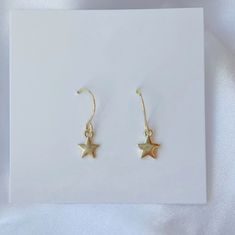 Dainty star charms on a gold or silver hook earrings. MATERIALS: gold: 14k gold plated brass base premium metal 18k gold-filled (hypoallergenic) silver: silver plated brass base premium metal *lead and nickel free Star Dangle Earrings, Silver Earrings Dangle, Star Charms, Gold Plated Silver, Hook Earrings, Clothes Pins, Post Earrings, Christmas Ideas, Gold Filled