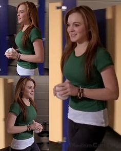 a woman in green shirt and black pants standing next to lockers holding a cup