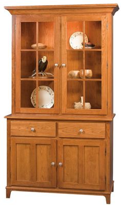 a wooden china cabinet with glass doors