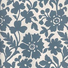 a blue and white wallpaper with flowers on it