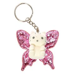 a keychain with a teddy bear in the shape of a butterfly