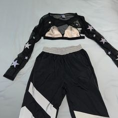 A Fun And Hipster Y2k Set Perfect For Your Next Rave Or Festival! A 3 Piece Set With Fun Color-Blocking Reflective Set. Top Details: Long Sleeves, Star Print, Triangle Bikini Top Bottom Details: Elastic Waist And Ankles, With Reflective Leg Wraps, Pull On Size: Large Color: Black Material: Nylon, Spandex Closure: Pullover Style: Outfit Set Condition: Excellent Used Condition With No Visible Flaws Styling Tip: Pair With Some Moto Boots And A Fun Hair Style Your Purchase Will Be Packed With Care A Sporty Long Sleeve Sets For Summer, Sporty Long Sleeve Summer Sets, Black Long Pants Sets For Spring, Black Sets With Long Pants For Spring, Sporty Pants For Night Out In Spring, Sporty Pants For Spring Night Out, Black Two-piece Summer Pants, Leg Wraps, Side Leggings