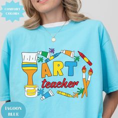 Discover the perfect Art Teacher Shirt with our Comfort Colors® collection, ideal for showing appreciation and as a back to school gift for art teachers. This Art Teacher Definition Shirt makes a thoughtful gift for art lovers and educators alike, available in various tops, tees, t-shirts, and tshirts. For an Oversized Look order 1 to 2 sizes larger than your normal size. 🌟100% ring-spun cotton 🌟Heavy fabric (6.1 oz/yd² (206.8 g/m 🌟Relaxed fit RETURNS: All products are made-to-order and becau Artistic Graphic Print Tops As Gift, Artistic Graphic Print Top As Gift, Artistic Graphic Print Top As A Gift, Artistic Graphic Print Art Gift, Artistic Graphic Print Art As Gift, Custom Print Cotton Art With Artsy Style, Custom Artwork On Cotton For Art Collection, Artistic Custom Cotton Artwork, Artistic Cotton Custom Artwork