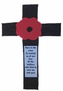 a cross with a red flower on it and a poem written in the center that says,