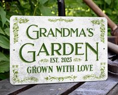 a sign that says grandma's garden est 2055 grown with love