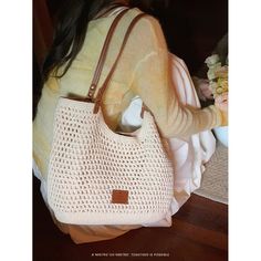 Natural beige colored woven tote bag. It has a distinctive soft texture and is accented with a brown leather strap. Items that will enhance your vacation mood. The atmosphere is casual and relaxed. 
 
 
 Size 
 
 
 FREE size 
 
 Height: 24cm 
 Width: 39cm 
 Depth: 9cm 
 
 
 
 
 
 Material 
 
 Polyester 
 Synthetic leather Colored Weave, Vacation Mood, Woven Tote Bag, Brown Leather Strap, Synthetic Leather, Soft Textures, Free Size, Leather Straps, Brown Leather