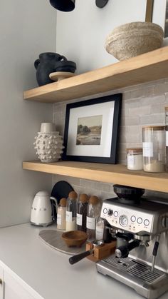 an espresso machine sitting on top of a counter