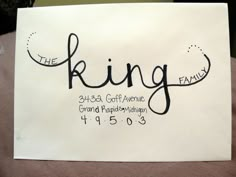 a white paper with the word king family written on it