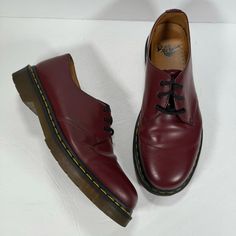 Brand: Dr. Martens Style: 3 Eye Leather Oxford Shoes Color: Cherry Red Condition: In Good Pre-Owned Condition. The Left Shoe Has Some Scuffing On The Inside Of The Shoe (Last Photo). See All Photos For Details And Wear. Size: Us Men's 10 -3-Eye Shoe -Trademark Yellow Welt Stitching -Leather Upper -Rubber Outsole Red Shoes Men, Red Dress Shoes, Dr Martens Style, Martens Style, Dark Red Dresses, Oxford Shoes Men, Shoe Last, Leather Oxford Shoes, Shoes Color