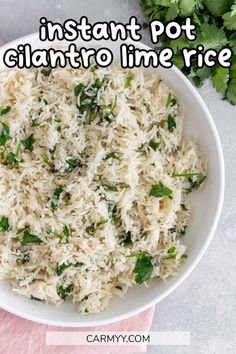 instant pot cilantro lime rice in a white bowl with parsley on the side