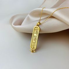 "Cartouche Egyptian Hieroglyphic Name Necklace 925 Sterling Silver, Egyptian Personalized Necklace,  Custom Name Jewellery, Personalized Gift ♡ DAINTY PERSONALIZED NECKLACE ♡ Welcome to my shop, All our produtcs handmade with love. Handmade silver necklace is a very nice and dainty gift that you can buy for your loved ones or yourself.  We are happy to create a design on the necklace with your name or special names for you.  ♡ Materials: High Quality 925 Sterling Silver, Gold Plated Silver and Rose Gold Plated Silver ♡ All necklaces will be carefully packaged and sent in a special gift box. I hope you can find your personalized necklace that suits you in our store. For other samples, please visit our store. ♡ HOW TO ORDER ♡ 1- Choose Color 2- Write the name you want on the necklace 3- Plea Egyptian Cartouche, Cartouche Necklace, Egyptian Gifts, Egyptian Hieroglyphics, Egyptian Jewelry, Mens Silver Necklace, Jewelry Fashion Trends, Etsy Personalized Gifts, Name Jewelry