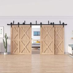 a living room with wooden floors and sliding doors