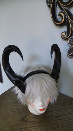 Fantasy horns WOW Daughter of Pan Horned Headband 3D printed super light weight horns only! This size is as close to the actual character horns as possible so you are getting that authentic look so hard to find. If you would like a different color please convo with instructions and we can accommodate your wishes. The horns will come in black if color is not specified at check out. The horns will be attached to a .5inch headband but you may request them unattached for your own project. Processing Character Horns, Viking Headdress, Fantasy Horns, Horned Headpiece, Black Horned Mask For Cosplay, Goat Horns Cosplay, Horned Fantasy Headpiece For Cosplay, Adjustable Horned Fantasy Headpiece, Demon Horns