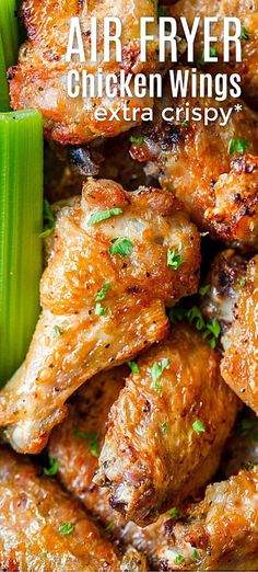 air fryer chicken wings with celery in the foreground and text overlay that reads, air fryer chicken wings extra crispy