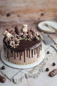 a cake with chocolate and marshmallows on top