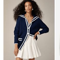 J. Crew Textured sailor cardigan sweater As seen in Saint-Tropez with the J.Crew Collective. . . A new sweater with nautical details, crafted from a soft cotton yarn that's woven a bit looser for peak breathability, but the standout feature is the sailor-style collar that drapes beautifully in the back. Plus, it comes with heritage-inspired patch pockets and contrast trim details that pop. 75% cotton/25% polyester. Hand wash. Imported. Item BZ484. Size: XS New with tags - No flaws Color: Navy Blue & White Sailor Cardigan, Chunky Jacket, Fall Cardigan, Sailor Fashion, Sailor Collar, Cardigan Sweaters For Women, Cardigan Sweater, Knit Cardigan, Sweater Outfits