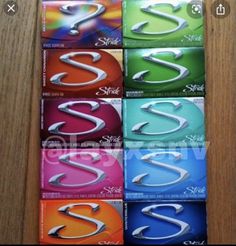 several different colored stickers with the letter s on them