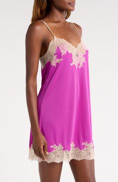 Bring an alluring style refresh to your sleepwear collection with this silky satin chemise veiled with pretty floral lace. 25 1/2" center front length (size Medium) V-neck Adjustable straps Unlined 100% polyester with 90% nylon, 10% elastane trim Machine wash, line dry Imported Silk V-neck Sleepwear For Wedding Night, Silk Feminine Nightgown, Feminine V-neck Satin Sleepwear, Elegant Pink Silk Sleepwear, Feminine Silk Nightgown With Spaghetti Straps, Feminine Silk Camisole Sleepwear, Pink Elegant Spaghetti Strap Nightgown, Silk V-neck Slip Dress With Delicate Lace, Elegant Pink Spaghetti Strap Nightgown