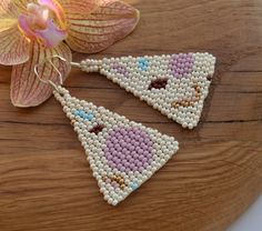 Hey, I found this really awesome Etsy listing at https://www.etsy.com/listing/678274179/beaded-asemitric-earrings-moon-sun Bohemian Triangle Beaded Earrings, Handmade Artsy Summer Jewelry, Handmade White Triangle Beaded Earrings, Triangle Shaped Earrings For Summer Gift, Triangle Shaped Summer Earrings For Gifts, Triangle Shaped Summer Earrings For Gift, Triangle Summer Earrings For Gift, Summer Triangle Earrings For Gift, Handmade Triangle Bohemian Jewelry