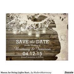 save the date card with mason jars and tree branches on wooden planks, in white