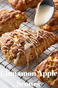 cinnamon apple scones with icing being drizzled on top