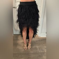 Black Feathered High-Low Skirt, Never Worn With Price Tags Still Attached. Perfect For A Night Out On The Town With Its Glamorous Design And Unique Feather Detailing. Glamorous Asymmetrical Skirt For Evening, Black Tiered Maxi Skirt For Party, Glamorous Black Cocktail Skirt, Black Asymmetrical Skirt For Party, Chic Feather Skirt For Night Out, Spring Feather Skirt For Night Out, Elegant Feather Trim Bottoms For Summer, Chic Feathered Skirt For Night Out, Black Asymmetrical Maxi Skirt For Party