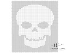 a cross stitch pattern with a skull on the front and back of it, in white