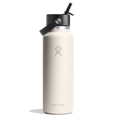 a white hydro flask bottle with a black lid