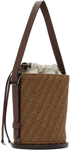 Structured woven faux-raffia and buffed calfskin top handle bag in tan. · Adjustable and detachable carry handle · Adjustable and detachable crossbody strap · Logo hardware at face · Bumper pads at base · Drawstring closure · Patch pocket at interior · Canvas lining · H7.5 x W6 x D5.5 Supplier color: Tobacco Leather Straw Bag With Intrecciato Weave, Brown Rectangular Bucket Bag With Intrecciato Weave, Brown Leather Straw Bag With Intrecciato Weave, Beige Top Handle Bucket Bag With Intrecciato Weave, Beige Bucket Bag With Intrecciato Weave And Top Handle, Chic Brown Straw Bag With Intrecciato Weave, Leather Satchel Straw Bag With Detachable Handle, Brown Top Handle Shoulder Bag In Woven Leather, Brown Woven Leather Bag With Top Handle