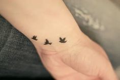 small birds tattoo on the wrist