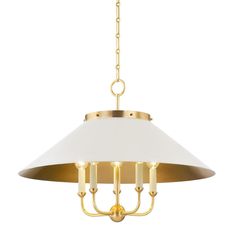 a brass chandelier with white shades on the bottom and gold trimmings